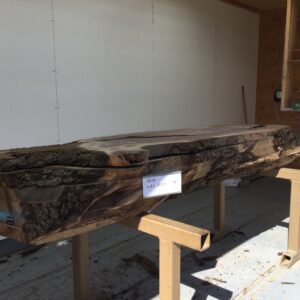 long wooden slabs on top of steel 