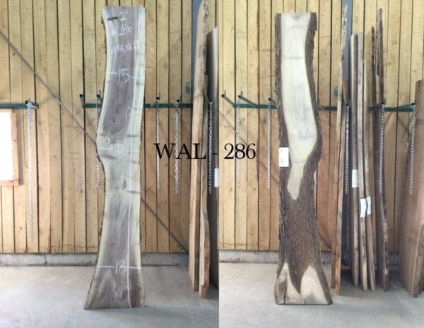 wooden slabs and planks against a wall with WAL 286 white text