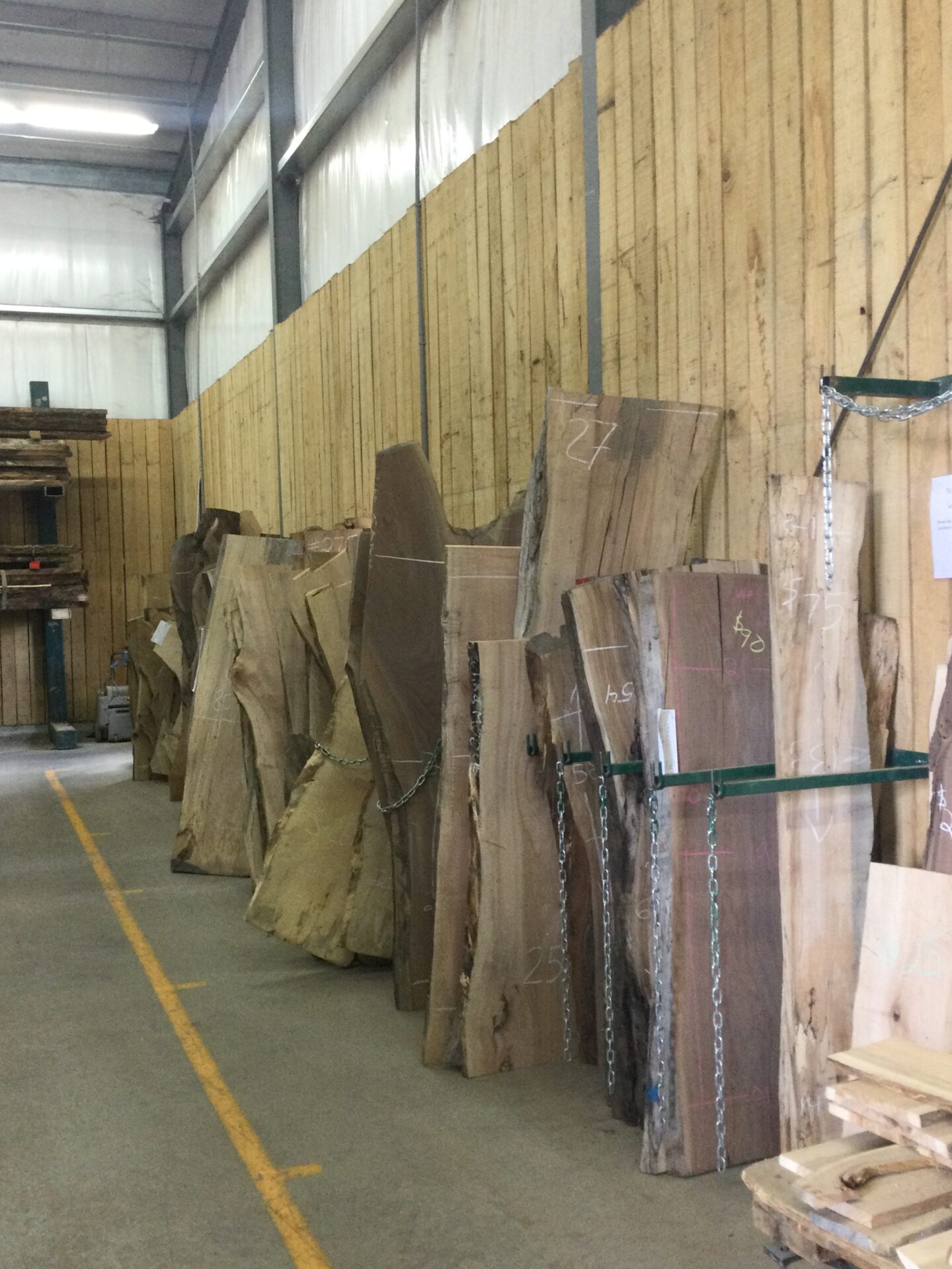 wood slabs leaning against flat wooden planks