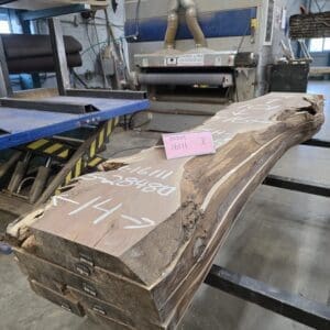 Live-edge wood slabs with chalk markings