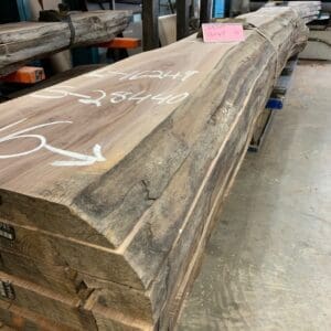 Long live-edge wood slabs with chalk markings